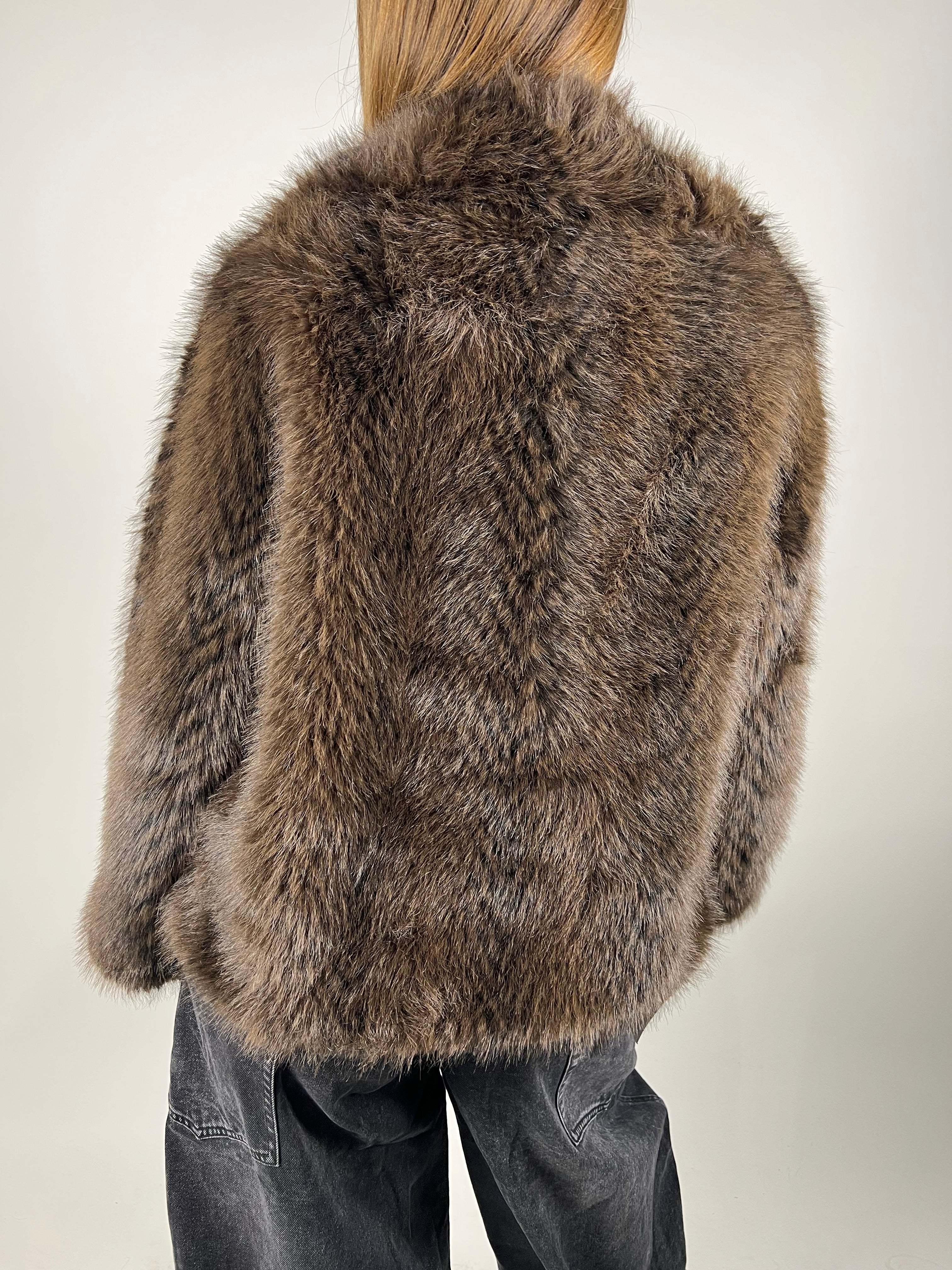 Pelliccia over beige